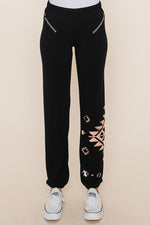 Jet Black French terry rollover joggers with rose gold tribal print