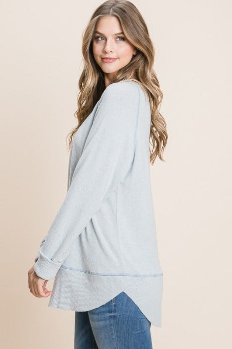 Sky Blue Tiger Brush boat neck top with cuffed sleeves and contrasting hem and stitch detail, relaxed fit tunic style.